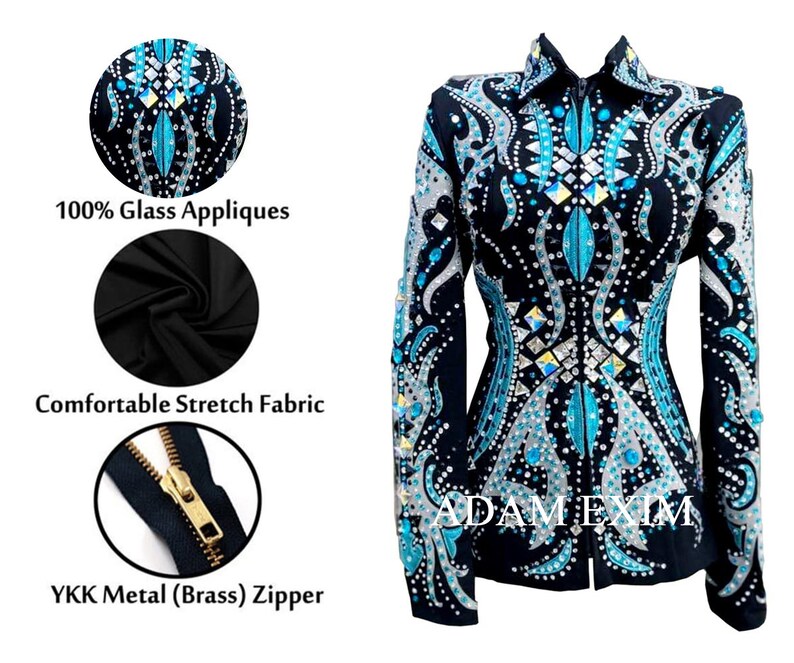 May include: Black show jacket with a teal and silver design featuring glass appliques. The jacket has a zipper closure and is made of stretch fabric. The zipper is a YKK metal zipper.