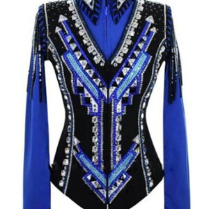 May include: A black and royal blue show shirt with a geometric design and rhinestones.