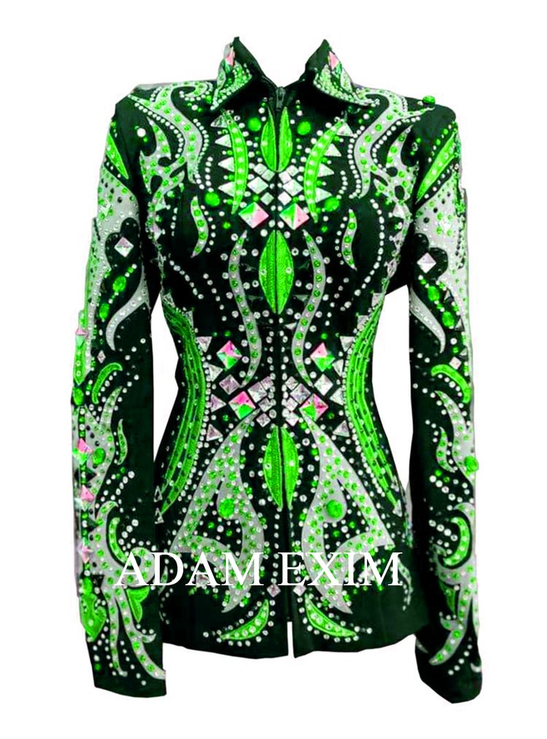 May include: A green and white show jacket with a zipper closure and rhinestone embellishments. The jacket features a unique design with a floral pattern and geometric shapes. The text "ADAM EXIM" is visible on the front of the jacket.