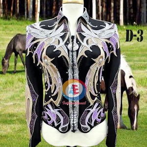 May include: Black show jacket with silver, purple, and gold embroidery. The jacket has a zipper closure and a collar. The jacket is on a mannequin in front of a green grassy field with horses in the background. The text "D-3" is visible in the upper right corner of the image.