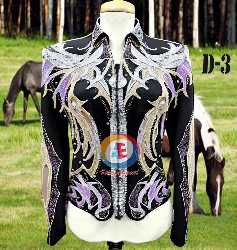 May include: Black show jacket with silver, purple, and gold embroidery. The jacket has a zipper closure and a collar. The jacket is on a mannequin in front of a green grassy field with horses in the background. The text "D-3" is visible in the upper right corner of the image.