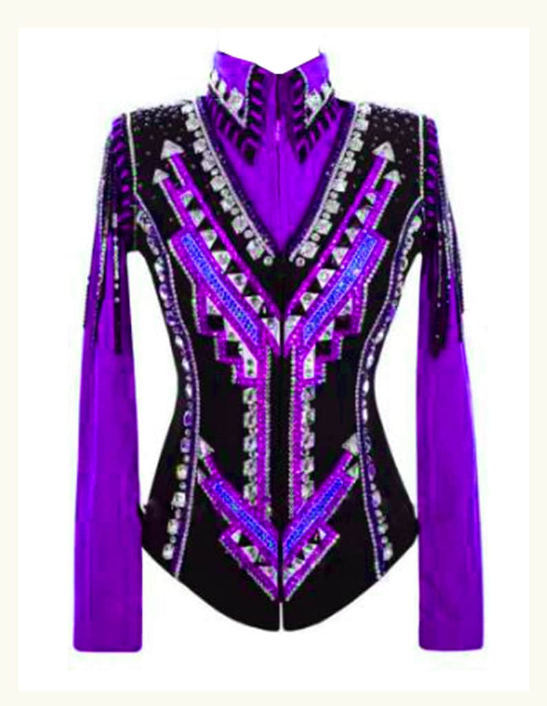 May include: Purple and black show jacket with a geometric design and rhinestones. The jacket has a zipper closure and long sleeves.