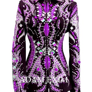 May include: A purple and silver show jacket with a rhinestone design. The jacket has a zipper closure and long sleeves.