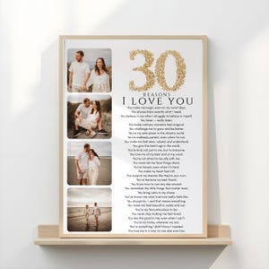 May include: A framed print featuring four photographs and text. The text says "30 REASONS I LOVE YOU" with a list of reasons. The number 30 is in gold glitter. The photos show couples in outdoor settings.