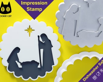 May include: White plastic cookie cutter with a scalloped edge, featuring a silhouette of the nativity scene with Mary, Joseph, and baby Jesus. The cutter is dishwasher safe and has the text "Impression Stamp" and "Dishwasher Safe" on it.
