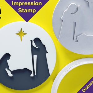 Puede incluir: Sello de impresión de galletas blanco y gris oscuro con un diseño de escena de la natividad. El sello presenta siluetas de María, José y el niño Jesús, con una estrella arriba. El texto "Impression Stamp" es visible.