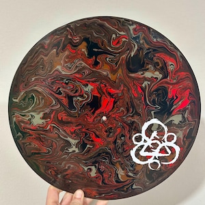 Copertina del disco in vinile dipinta con la scritta "Keywork" dei Coheed and Cambria
