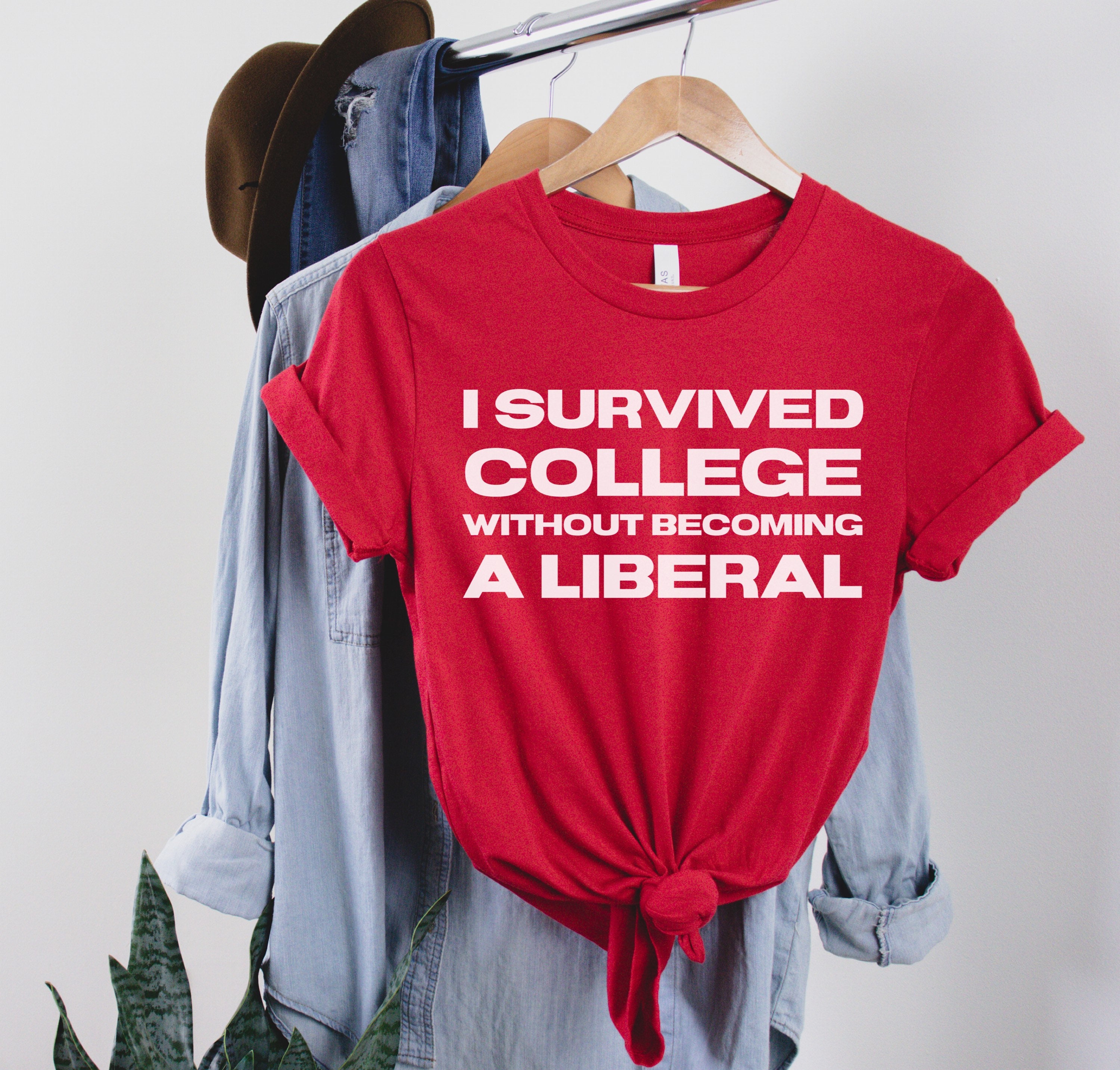 I Survived College Without Becoming A Liberal T-Shirt. I Survived College Without Becoming A Liberal T-Shirt.