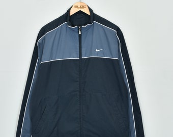 nike shell suit jacket