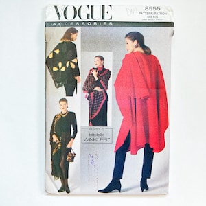 May include: Vogue Accessories pattern 8555 for a cape, designed by Bebe Winkler. The pattern shows three different styles of capes, one in red, one in black and white, and one in black with yellow accents.
