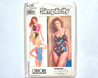 May include: Simplicity sewing pattern 9210 for a swimsuit with three different styles. The pattern is for sizes 18 and 20. The pattern includes instructions for an overlock or serger machine.