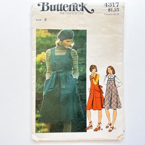May include: Vintage sewing pattern for a dress with a tie waist and pockets. The pattern is from Butterick, the Fashion One, and is size 8. The pattern number is 4317 and the price is $1.25.
