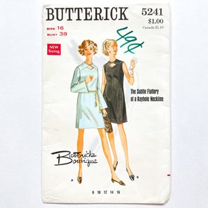 May include: Vintage sewing pattern for a dress with a keyhole neckline. The pattern is from Butterick Boutique and is size 16, bust 38. The pattern is for a dress with a keyhole neckline and is called "The Subtle Flattery of a Keyhole Neckline".