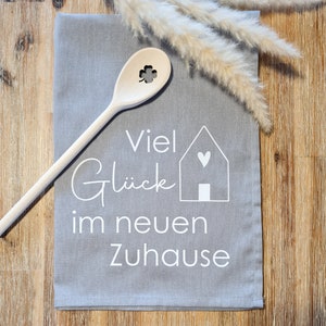 Geschenk zum Einzug oder Umzug, Mitbringsel neue Nachbarn
Küchentuch mit Kochlöffel, Hausbau Geschenk