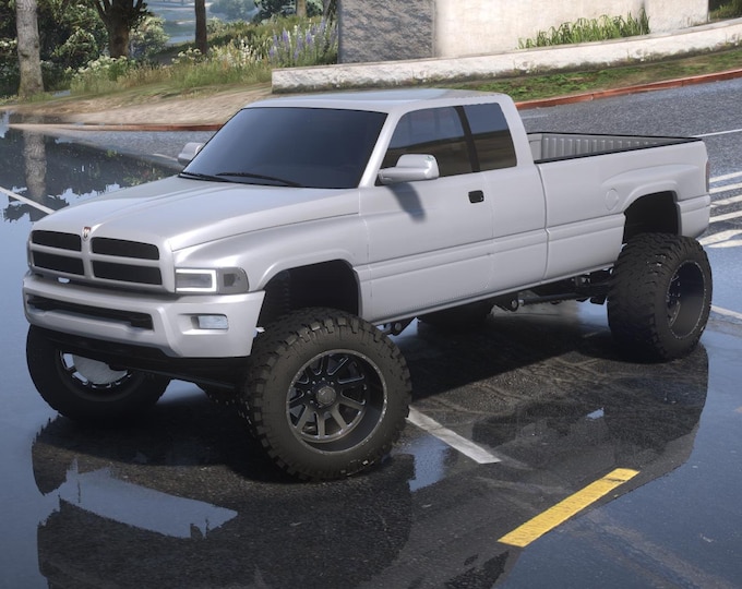 Featured listing image: 2002 Dodge Ram Cummins 2500/Mega Stance