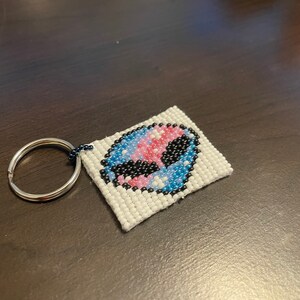 Galaxy alien head keychain