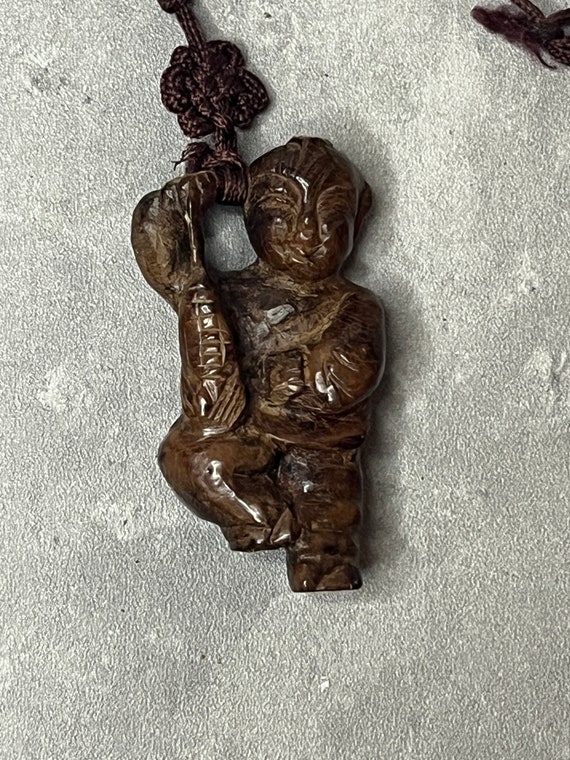 Vintage Carved Wood Chinese Man Figurine Necklace - image 1