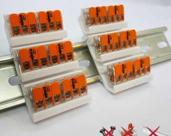 Set van 2 montagebeugels geschikt voor Wago-aansluitingen 221-413 op een DIN-rail.