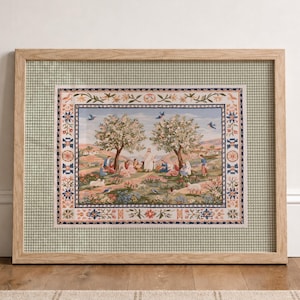 May include: A rectangular framed tapestry featuring a central scene of figures gathered under two trees in a landscape. The artwork is surrounded by a decorative floral border and a light green checkered mat, all encased in a light wood frame.
