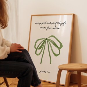 May include: A framed print with a green watercolor bow and the text "every good and perfect gift comes from above james 1:17".