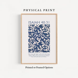 May include: A framed print with the text "PHYSICAL PRINT" at the top. The print features the text "ISAIAH 40:31" above a blue and white bird design. Below the design is a Bible verse. The words "Printed or Framed Options" are at the bottom.