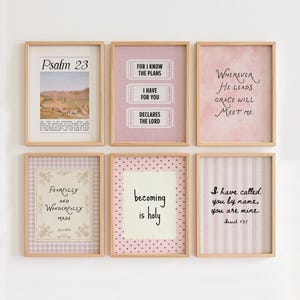 May include: Six framed wall art prints with light wood frames. The prints feature various religious quotes and verses, including Psalm 23, For I know the plans, Wherever He leads grace will meet me, Fearfully and wonderfully made, becoming is holy, and I have called you by name, you are mine.