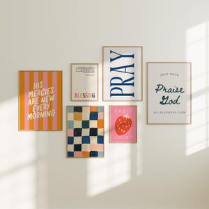 May include: A set of six framed prints with inspirational quotes and abstract designs. The prints feature a variety of colors, including pink, orange, yellow, blue, and green. The quotes include "His Mercies Are New Every Morning", "Blessing", "Pray", "Fruit of the Spirit", "From Whom All Blessings Flow", and "Praise God".