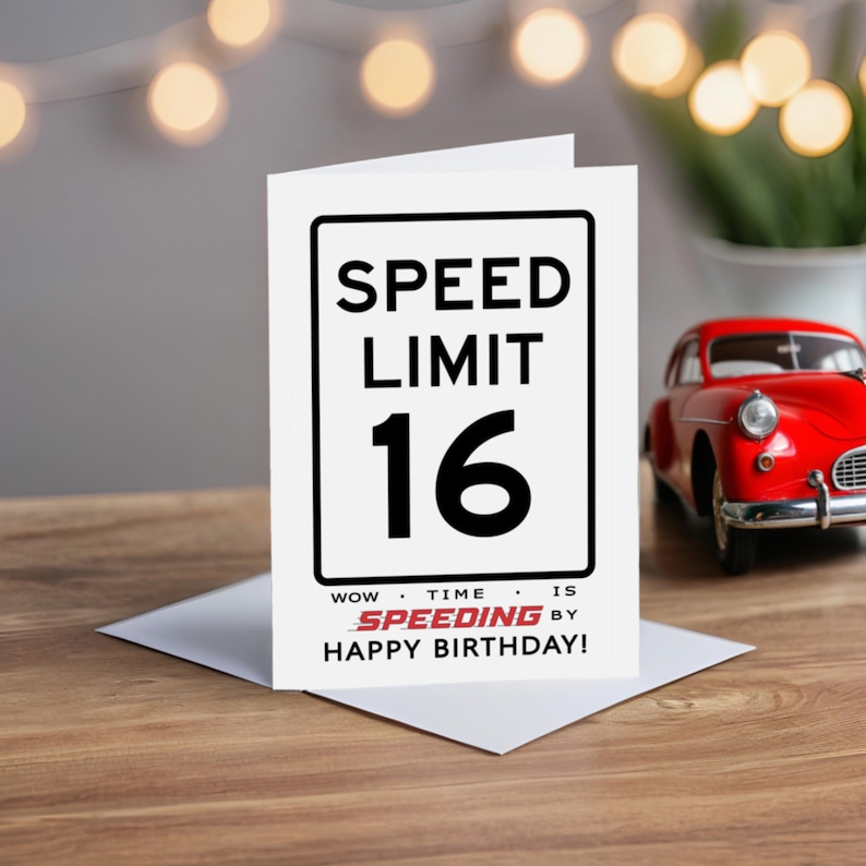 Celebrate their 16th birthday with a charming Speed Limit Birthday Card, beautifully displayed alongside a classic red model car. This delightful pairing adds a nostalgic touch to their special birthday.