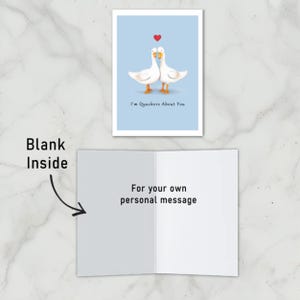 The inside of the Ducks in Love Anniversary Card is intentionally left blank, giving you the space to write a heartfelt message and add a personal touch to your loved one's special day