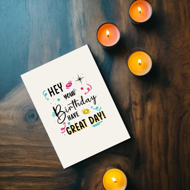 Set on a brown oak table with glowing candles, the Birthday Card brings a cozy and festive touch to the celebration.