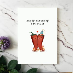 Spice up their birthday with this adorable card featuring two chili peppers in love holding hands! Perfect for the hot stuff in your life, this card is a fun and heartfelt way to show your love. Great for partners who brings the heat!