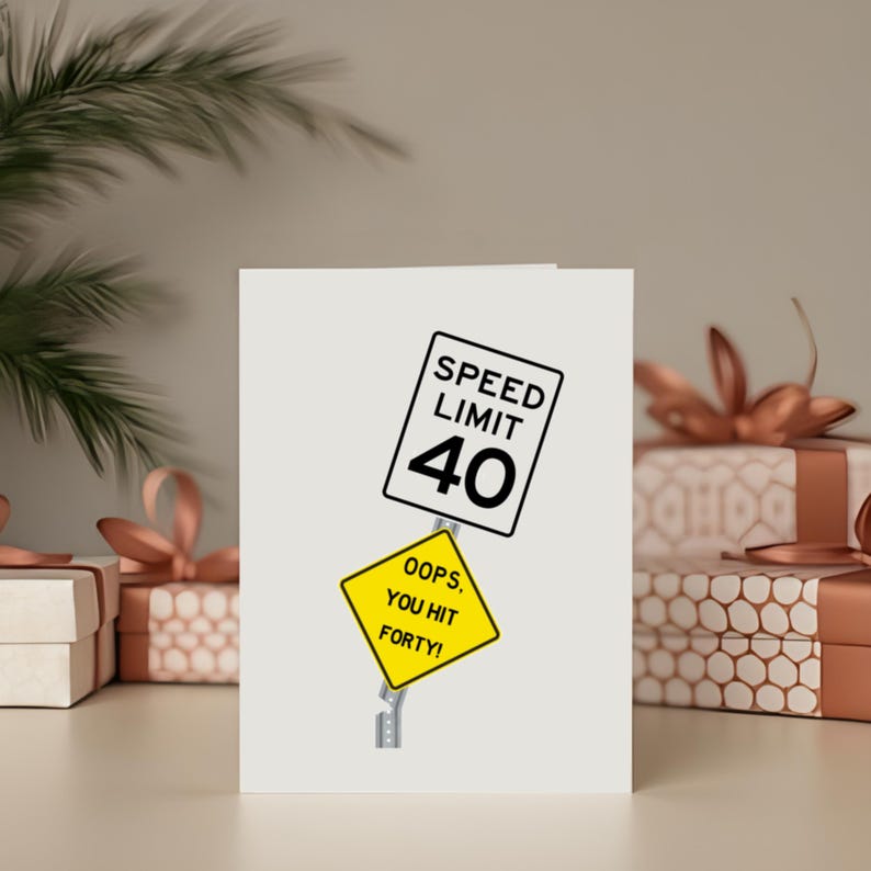 Celebrate their 40th birthday with a quirky 'Oops You Hit 40' Birthday Card, showcased next to birthday presents. This charming card adds a special touch, enhancing their celebration and making their milestone birthday even more memorable.