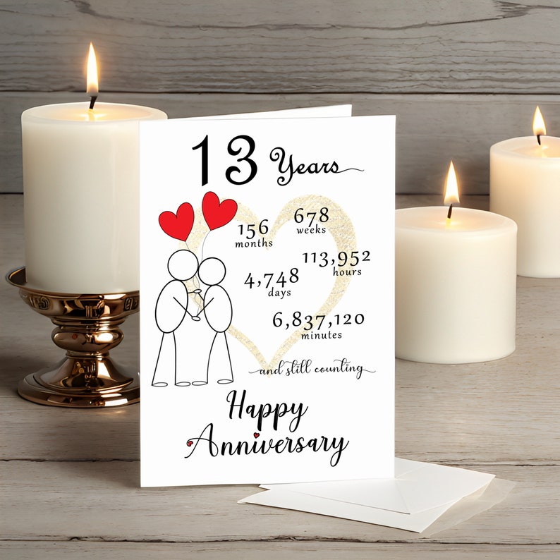 Celebrate your 13 year anniversary with an enchanting card that features a gold heart and intertwined heart balloons held by stick figures. It's presented alongside white candles adding a touch of romance and charm.