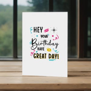 This picture shows the 'Hey, it's Your Birthday!' Card in front of a window with trees in the background, highlighting a charming view.