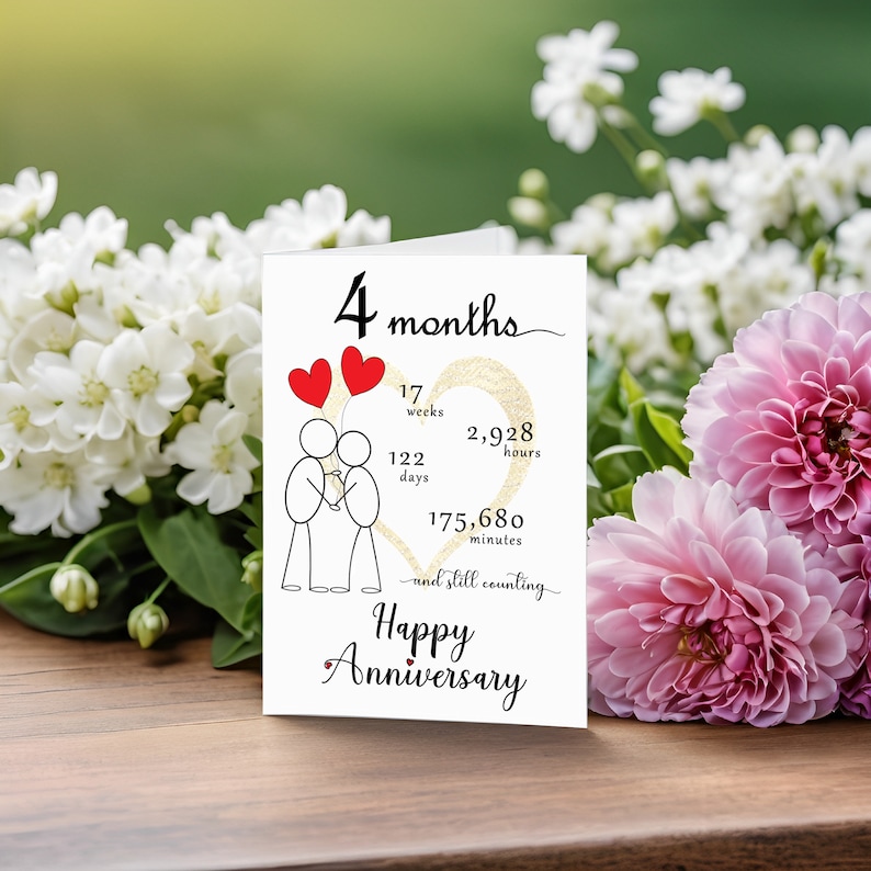 Commemorate your 4 month anniversary with an enchanting card featuring a prominent gold heart set against a backdrop of flowers, gently faded for timeless elegance.