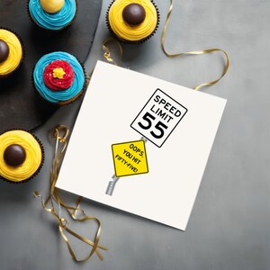 Celebrate their 55th birthday with a delightful 'Oops You Hit 55' Birthday Card, displayed next to cupcakes. This charming combination adds a memorable touch to their special day, symbolizing the start of an exciting new chapter in their life.