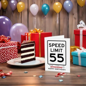 Celebrate their 55th birthday with an enchanting Speed Limit Birthday Card, showcased next to birthday presents and cake.