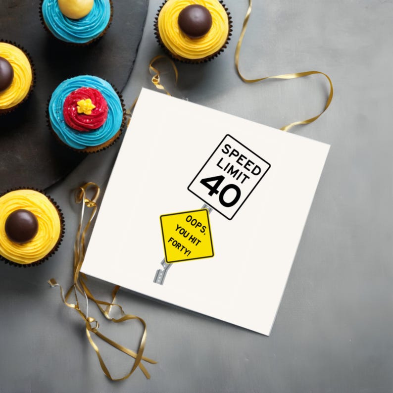 Celebrate their 40th birthday with a delightful 'Oops You Hit 40' Birthday Card, displayed next to cupcakes. This charming combination adds a memorable touch to their special day, symbolizing the start of an exciting new chapter in their life.