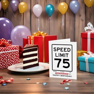 Celebrate their 75th birthday with an enchanting Speed Limit Birthday Card, showcased next to birthday presents and cake.