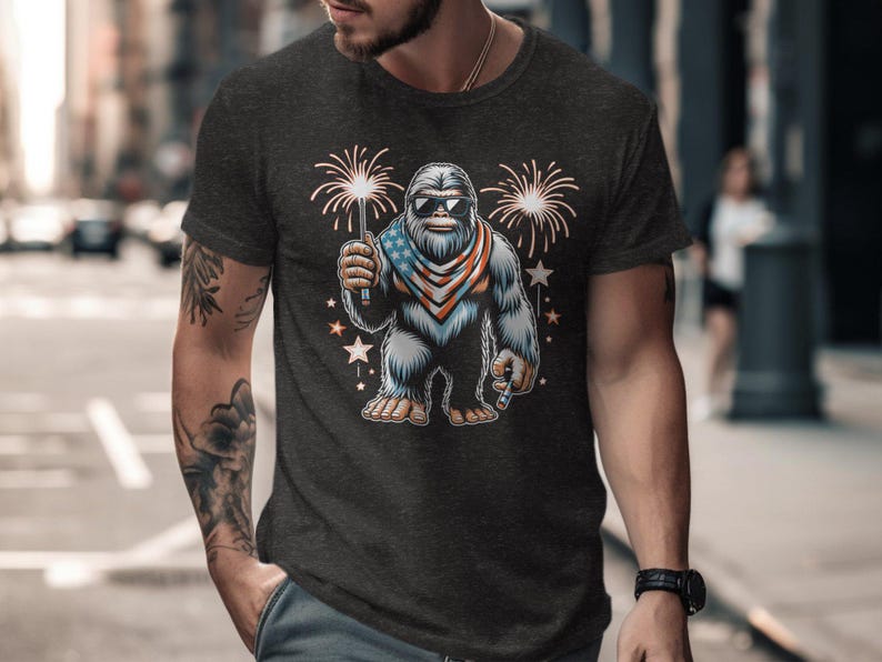 Bigfoot T-Shirt, Patriotic Bigfoot Graphic Tee, Bigfoot Fireworks Shirt, Funny Sasquatch Independence Day Tee, Unique Bigfoot Gift