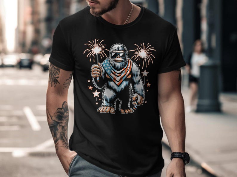Bigfoot Patriotic T-Shirt, 4th of July Sasquatch Shirt, Independence Day Graphic Tee, USA Bigfoot Fireworks T-Shirt