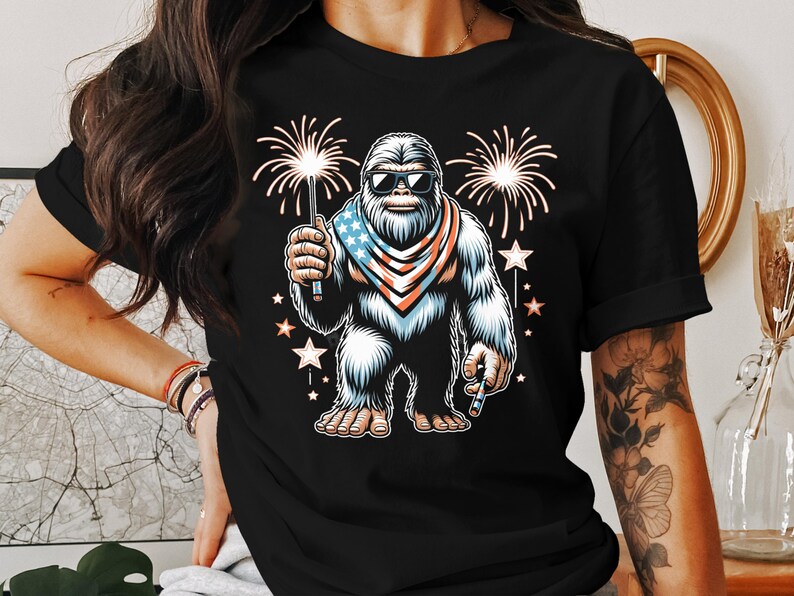 Bigfoot Patriotic T-Shirt, 4th of July Bigfoot Shirt, Sasquatch Fireworks Tee, Funny USA Shirt, Independence Day Yeti Top