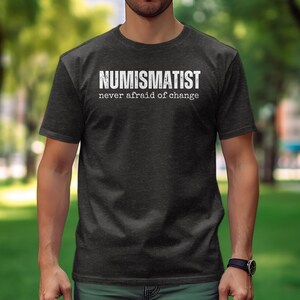 Numismatist Humor T-Shirt, Funny Coin Collector Joke Image Tee, Novelty Numismatic Gift Shirt, Never Afraid Of Change Print Dark Heather Grey