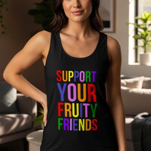 May include: Black tank top with the text "SUPPORT YOUR FRUITY FRIENDS" in rainbow colors. The tank top is sleeveless and has a scoop neck.