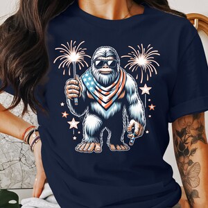 Bigfoot July 4th Fireworks T-shirt, Patriotic Sasquatch Graphic Tee, Funny Independence Day Shirt, Unique Bigfoot Apparel