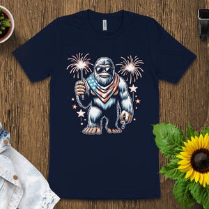 Patriotic Bigfoot T-Shirt, Funny Bigfoot with Fireworks Tee, American Sasquatch Shirt for Independence Day, July 4th Shirt