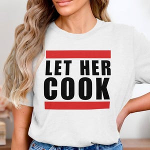 Let Her Cook T-Shirt, Funny Statement Tee, Casual Graphic Tee, Trendy Phrase Shirt, Bold Lettering Top, Unisex Tee, Gift Idea