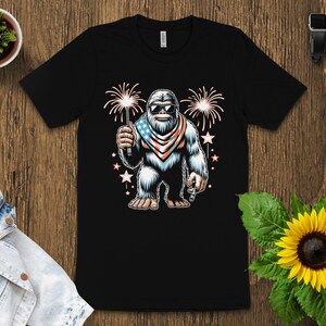 Bigfoot Fireworks Graphic Tee, Patriotic Bigfoot Shirt, American Flag Sasquatch T-shirt, Fun Fourth of July Outfit, Novelty USA Tee