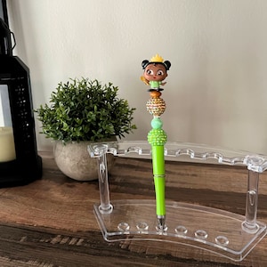 Bolígrafo con cuentas con el personaje de la princesa rana y la bebé Tiana, bolígrafo con autógrafo de Parks, fabricado con licencia de Disney, bolígrafo coleccionable con el personaje