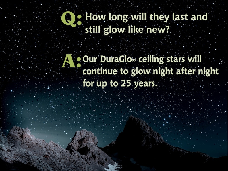 May include: A dark blue night sky with stars and two rocky mountains in the foreground. Text on the image reads: "Q: How long will they last and still glow like new? A: Our DuraGlo ceiling stars will continue to glow night after night for up to 25 years."